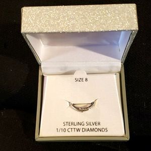 Sterling silver ring 1/10 CTTW Dimonds.